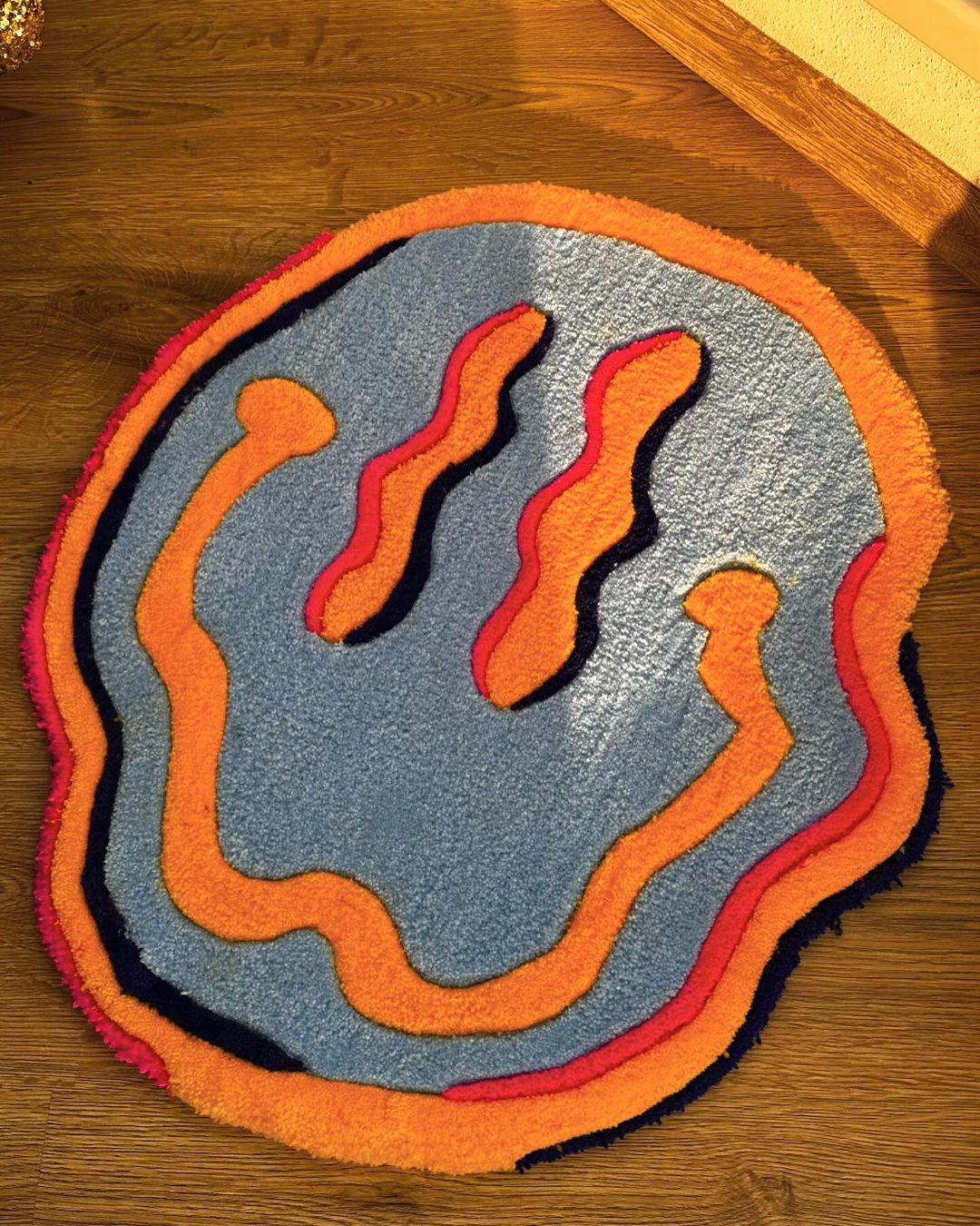 Dripping Smiley Face Rug